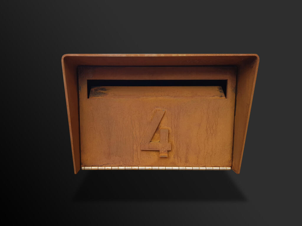 A modern take on a traditional style letterbox; Letterbox made from Corten steel with a natural rusted finish