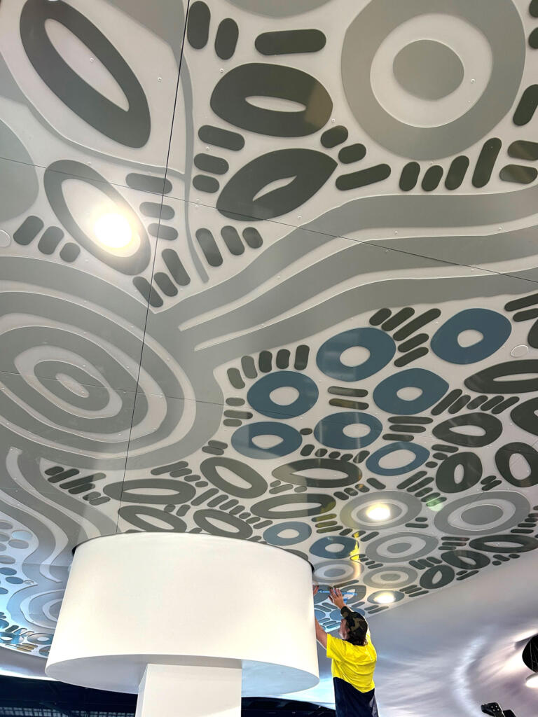 Artwork by Kamara Morgan featured in Knox Library fabricated by Lump Sculpture Studio; First Nations artwork installed on the ceiling of the new Knox Library;