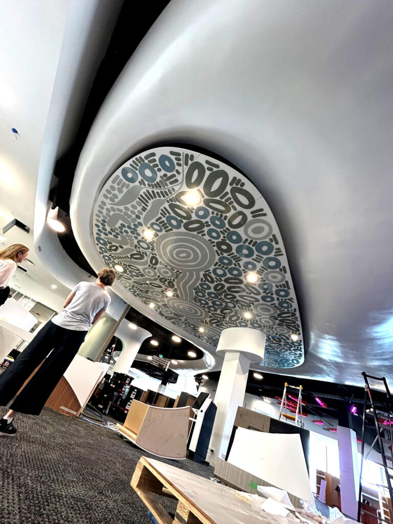 Artwork by Kamara Morgan featured in Knox Library fabricated by Lump Sculpture Studio; First Nations artwork installed on the ceiling of the new Knox Library;