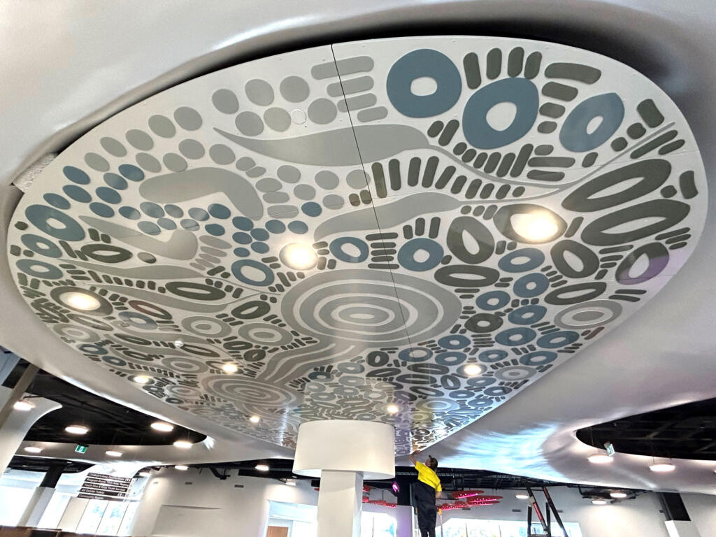 Artwork by Kamara Morgan featured in Knox Library fabricated by Lump Sculpture Studio; First Nations artwork installed on the ceiling of the new Knox Library;