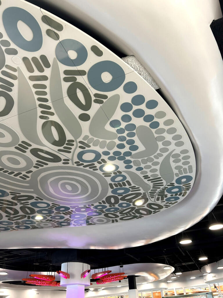 Artwork by Kamara Morgan featured in Knox Library fabricated by Lump Sculpture Studio; First Nations artwork installed on the ceiling of the new Knox Library;